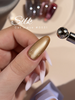 gelpolish van het merk DNKa' in de kleur ' 0031 Cat's Eye Silk' - gouden bronzen tint
