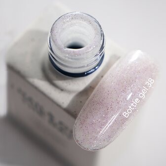 Bottle Gel 38 van het merk Nails Of The Day - roze glitter tint