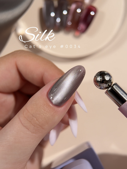 gelpolish van DNKa' in de kleur ' 0034 Cat's Eye Silk' - bruin grijze tint