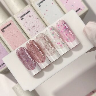 Cover base 42 van Nails Of The Day - roze tint 