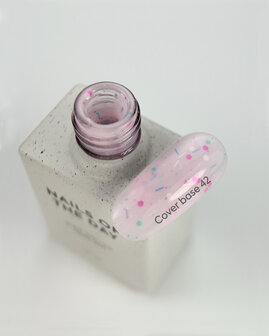 Cover base 42 van Nails Of The Day - roze tint 